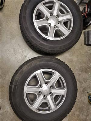17" Ford Ranger mags with good used 265/65/17 All terrain tyres 