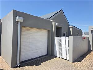 Spacious 2 bedroom townhouse in popular Laguna Sands near all amenities