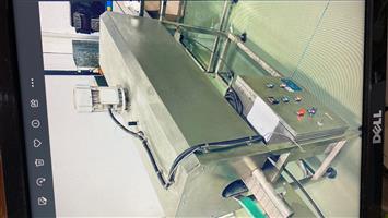 Shrink sleeve tunnel for bottles