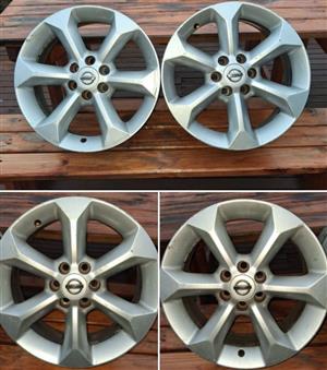 Nissan Navara D40 original OEM factory 17 inch alloy rims for sale.