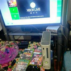 Xbox 360 + 4 games 1 controller and cables 