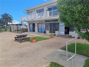Exceptional Investment & Lifestyle Opportunity in Franskraal, Overberg. Building AND vacant stand.