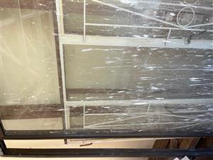 STEEL WINDOW FRAME HEAVY DUTY COMPLETE WITH GLASS AND BURGLAR BARS  1500 X 1555 