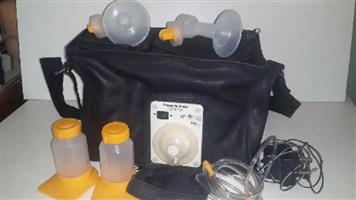 Madela Breast Pump in a bag and Bottles 
