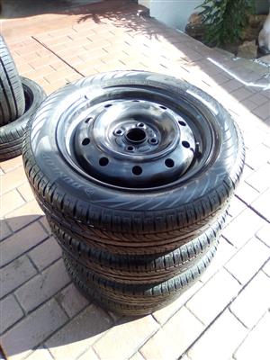 Set 15inch rims 4/100pcd with Dunlop tyres 185/60/15 2xtyres as new 2x60% thread
