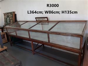 Two, large, wood and glass display cases