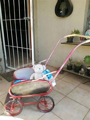 Doll pram with teddy for sale
