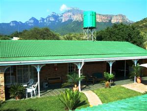 Fully operational B&B in Kampersrus or as a large family home (on the foothills of Mariepskop Mountain) near Hoedspruit and KNP for sale. Serious Buyers  only please.   
