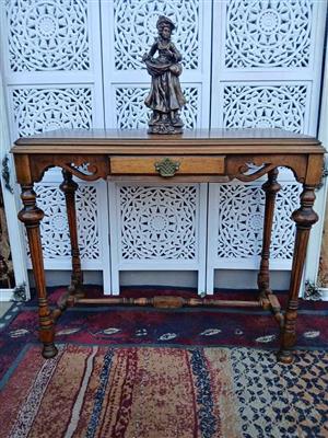 Vintage Wooden Console Table with Ornate Statue