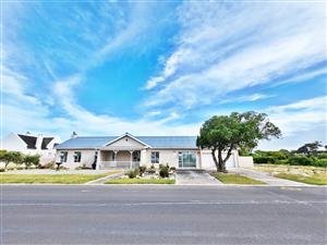 Established Coastal Home in a Sought-After Beach Area