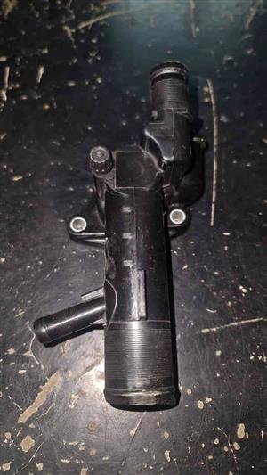 Nissan np200  thermostat housing