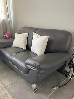 Grey couches for sale. A 3 seater and 1 seater 