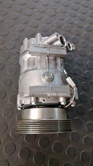 NP200 AIRCON PUMP. ORIGINAL .BRAND NEW. FOR VARIOUS OTHER CARS TOO.