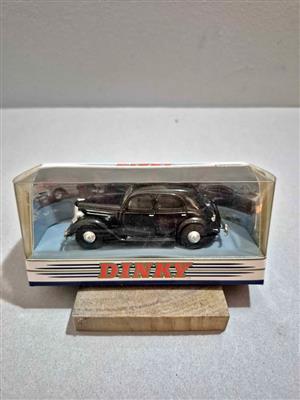Matchbox Dinky 1:43 scale model of a black 1950 Ford V8 Pilot.