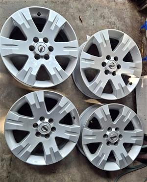 Original OEM factory rims for Nissan Navara. Size 17inch x 7.0J