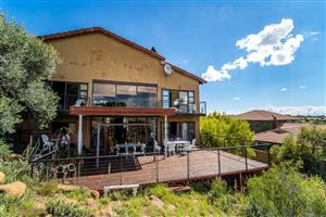 Welcome to your dream home in the heart of Woodland Hills Wildlife Estate.