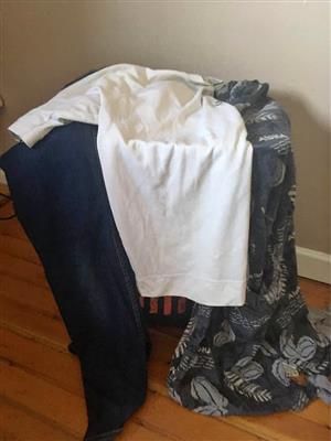 Black bag full of clothes