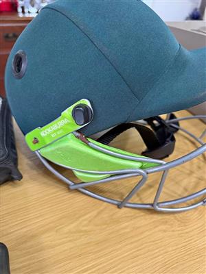 Kookaburra cricket helmut and knee pads with accessories
