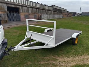 Newly build trailer without  pappers great for loading bikes and longer stuff