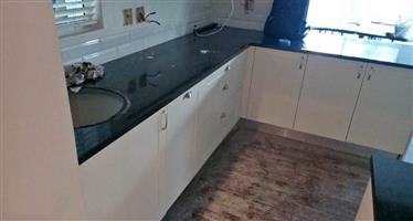 Full Kitchen cupboards . Already dismantled and ready for collection in Camps Bay . Excludes granite
