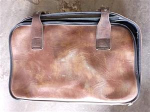 Brown Faux Leather Suitecase for travel