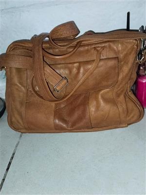 Genuine leather handbag  or computer bag.