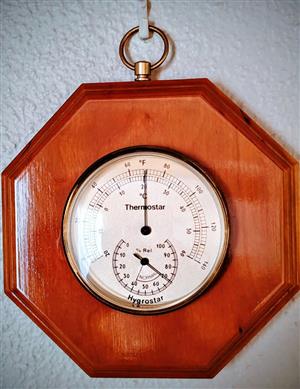 Antique thermometer/hygrometer combo in a beautiful solid cherry wood finish.