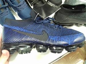BLUE AND BLACK NIKE SHOES