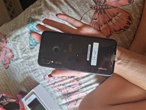 Huawei phone,dual sim and camera,barely used cracked screen barely visible