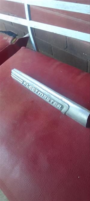 Fleetmaster badge. 