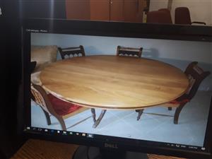 Solid wood dining room table and 6 chairs