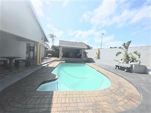 Luxury 4-Bedroom Modern Home with Pool & Entertainment Area