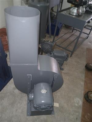 Dust extractor for woodworking machinery