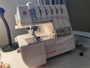 Singer Sewing Machine. Serger/Coverstitching.  Hardly used and recently serviced