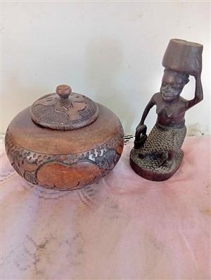 Wooden carved bowl with figure