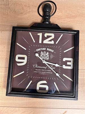This Chateau Renier square wall clock is a decorative home decor. 38x38
