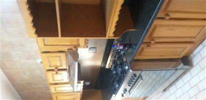Oak kitchen cabinets and granite tops