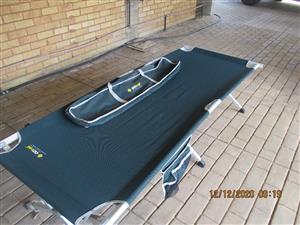 3x stretchers and camping table brand new offer welcome