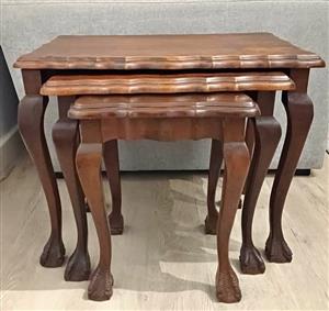 3 x Wooden nesting coffee tables . Seapoint . 45.5cm high  58x40cm and the 2 smaller ones fit under