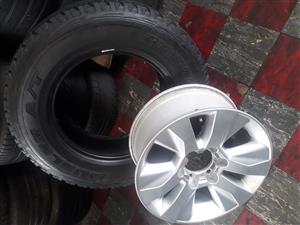 17" new edition Toyota mag and a 265/65/17 used tyre for spare wheel 