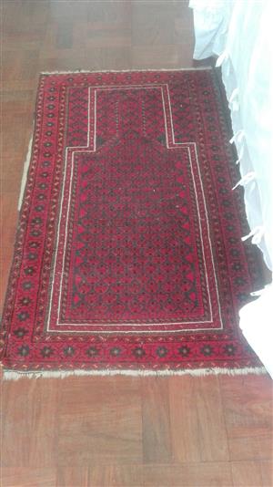 Persian and machine rugs