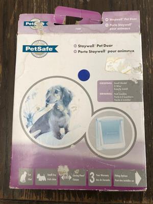 Petsafe Pet door - Ideal for a small dog or large Cate - brand new with instructions.
