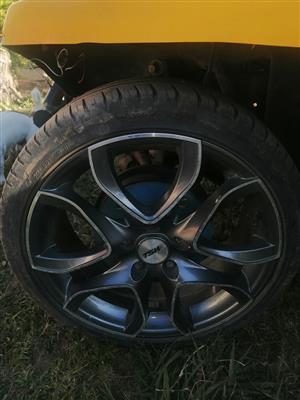 4 17 inch Mag Rims 5 holes 2 tyres in good condition 