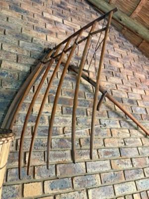 Traditional wooden grain cradle scythe