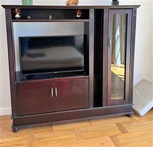 Solid Wooden Tv unit with cupboards and shelves.  Size width 166cmx160cm height