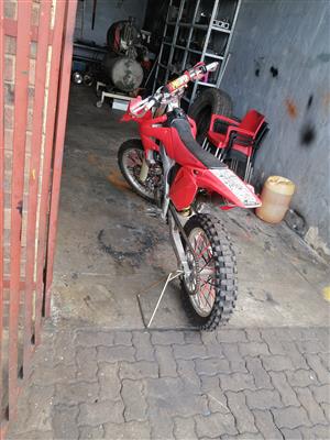 2004 CRF250R. Start at first kick. Good condition. No swapping. 