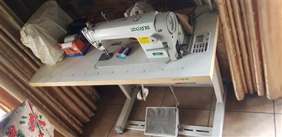 Zoje sewing machine used at home once still as good as brand new