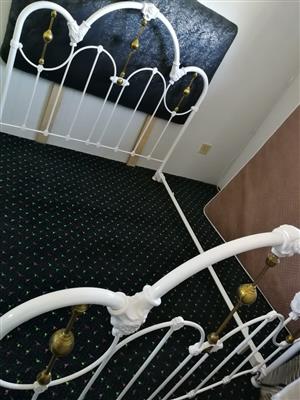 White ceramic and brass queen size bed