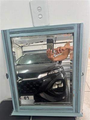 Mirror with wood frame