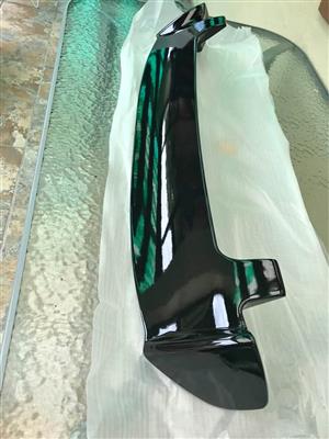 Universal roof spoiler